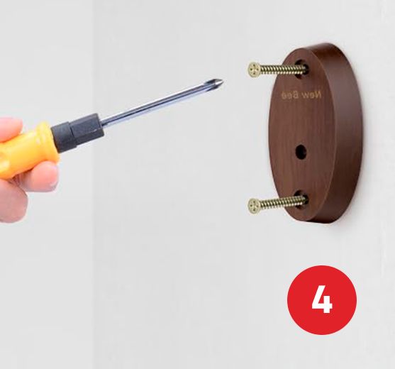 Cómo colgar una guitarra en la pared con soporte y tornillos